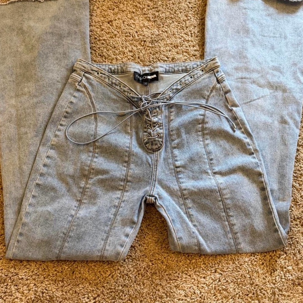 Never wore fashion nova laced up jeans. Size 11 fits a size Medium large